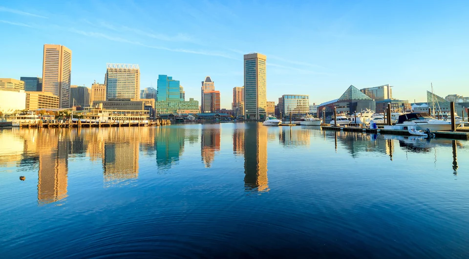 Baltimore Harbor skyline with reflection in still water